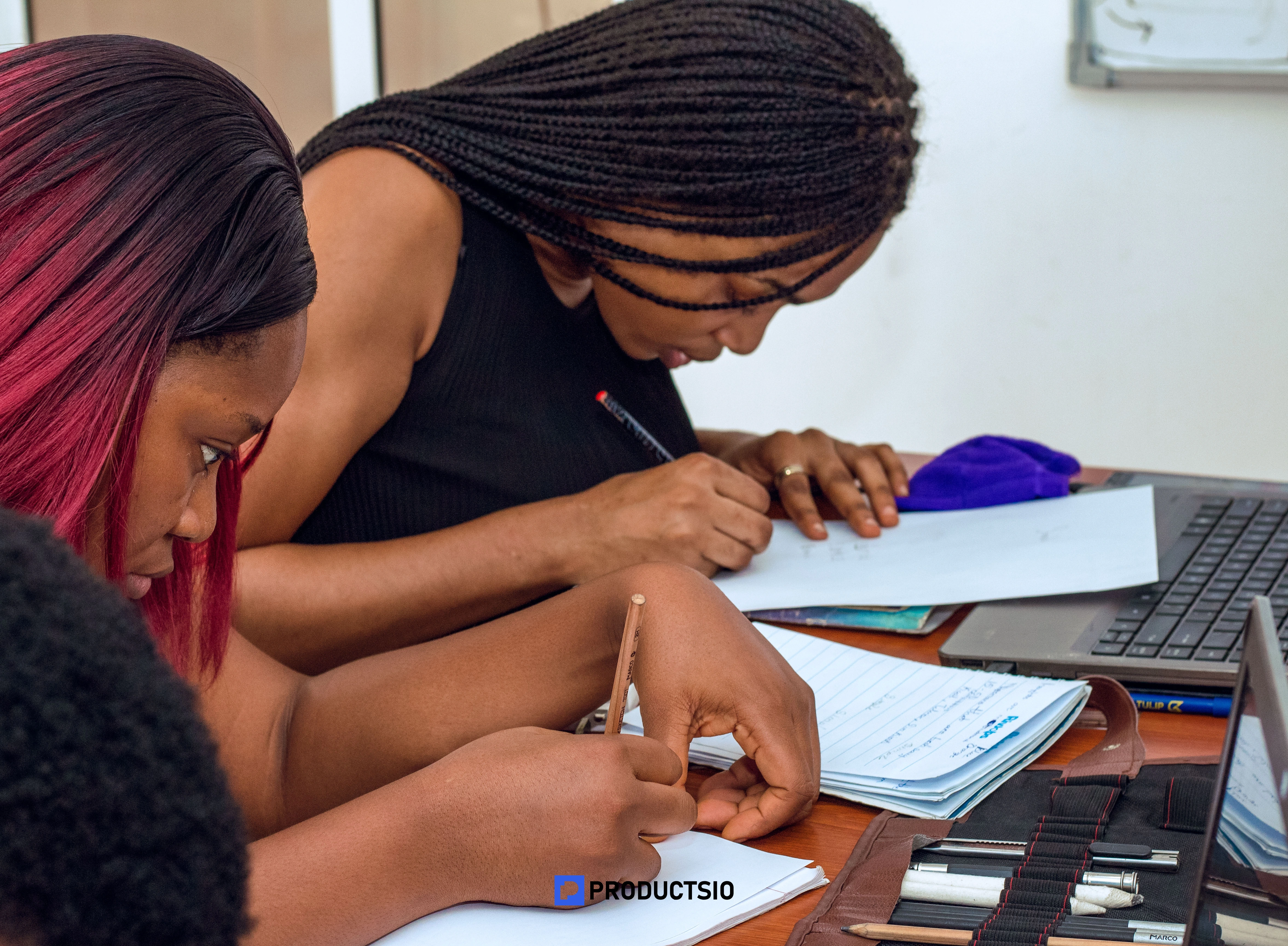 Students collaborating in class
